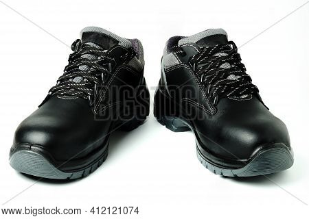 Brand New Black Leather Safety Shoes. Special Construction Workers Boots Isolated On White. Workboot