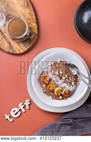 Teff Grain Porridge With Banana Topping For Breakfast