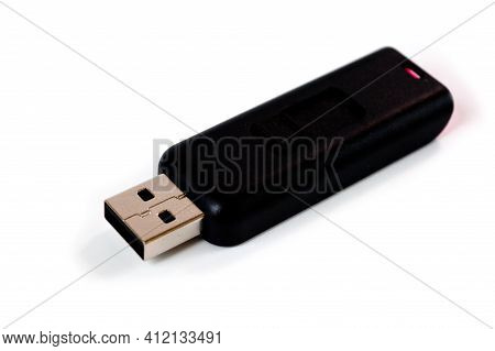 A Pink Usb Flash Drive With A Plastic Case, Shot Against A White Background.