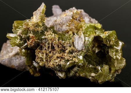Macro Pyromorphite Mineral Stone On A Black Background