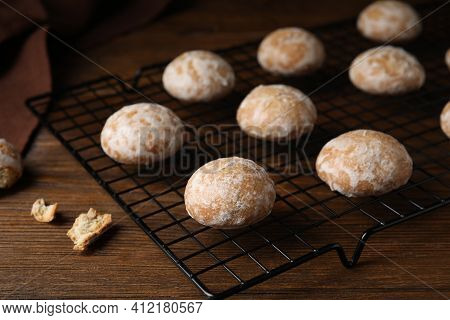 Tasty Homemade Gingerbread Cookies On Wooden Table