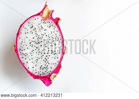 Pitahaya Dragon Fruit Fresh Half Cutted With White Pulp And Balck Seeds On A White Background. Pitay