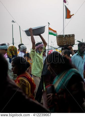 Unidentified Women And Men Trade In A Wide Variety Of Fish At One Of The Oldest Fish Market In Mumba