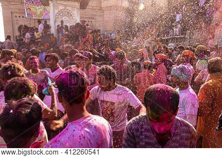 March 2021 Vrindavan,mathura.
People Celebrating Holi At Barsana On Holi Festival With Selective Foc