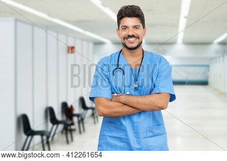 Handsome Hispanic Male Doctor Is Ready For Vacinating Patients Against Coronavirus Infection