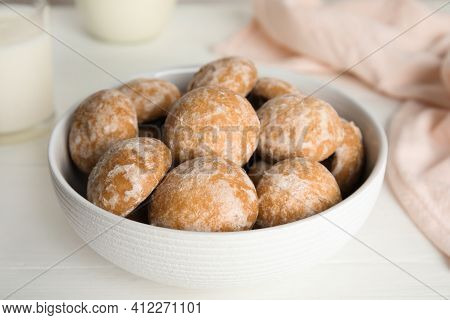 Tasty Homemade Gingerbread Cookies In Bowl On White Table, Closeup