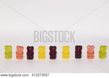 Colourful Sweet Gummy Bears Isolated On White Background.