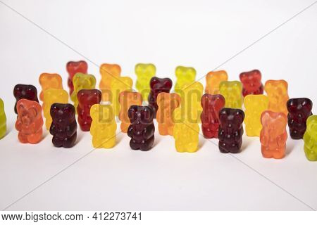 Colourful Sweet Gummy Bears Isolated On White Background.