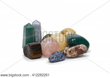 Collection Of Natural Stones. Amulets And Talismans. Esoteric Concept. Isolated Over White Backgroun