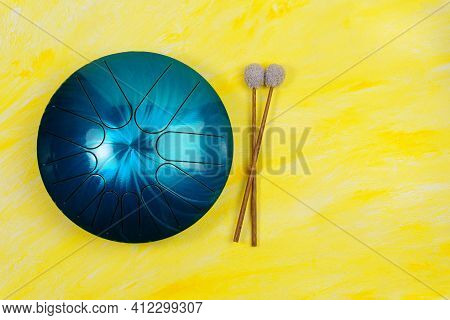 Hang Musical Instrument, Glucophone. Metal Tongue Drum, Modern Musical Instrument. Top View Copy Spa