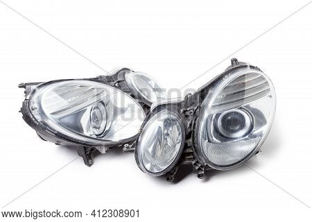 Stylish Xenon Right Headlight Of A German Car - Optical Equipment With A Lamp Inside On A White Isol