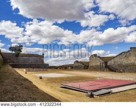 Almeida, Guarda, Portugal; August 2020: Entance And Fragment Of The Fortified Medieval Walls Of The 