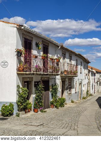 Almeida, Guarda, Portugal; August 2020: Entance And Fragment Of The Fortified Medieval Walls Of The 