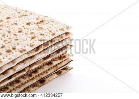 Jewish Matzah Isolated On White Background. Jewish Traditional Easter Bread. Passover Celebration Sy