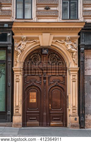 Vienna, Austria - Feb 7, 2020: Wooden Gate With Goddess Embellishment On Josephstadt Street In City 