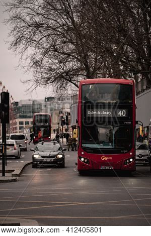 London Uk February 2021 Cold Vertical Winter Shot Of A Number 40 London Bus Waiting On An Intersecti