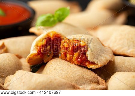 Margarita Margherita Pizza Parcels Pockets Filled With Tomato, Mozzarella Cheese And Basil Served On