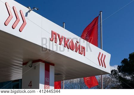 Russia, Sochi - March 4, 2021: Lukoil Gas Station In The Center Of Sochi. Lukoil Brand Logo Close Up