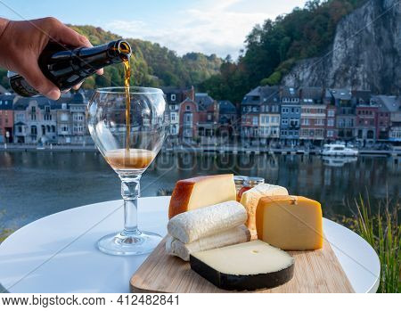 Pouring Of Belgian Abbey Beer And Tasting Of Cheeses Made With Trappist Beer And Fine Herbs With Vie