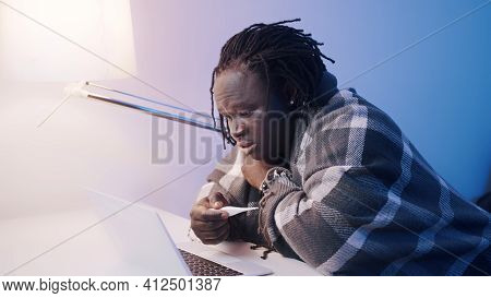 Unwell Man With High Fever Seeking Help From Docor Remotely. High Quality Photo