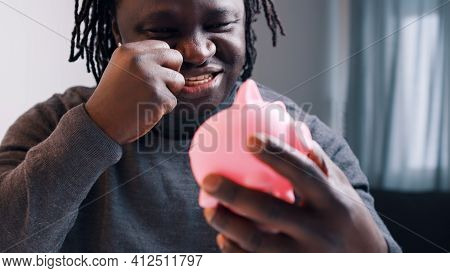 Happy Excited African American Black Man Happy For Invesments Growth. Retirement Plan And Financial 