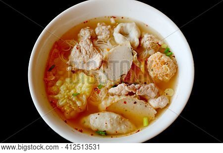 Closeup A Bowl Of Thai Rice Noodles Soup With Assorted Fish Balls And Pork