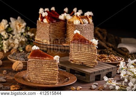 Slice Of Homemade Hungarian Dobosh Cake With Caramel