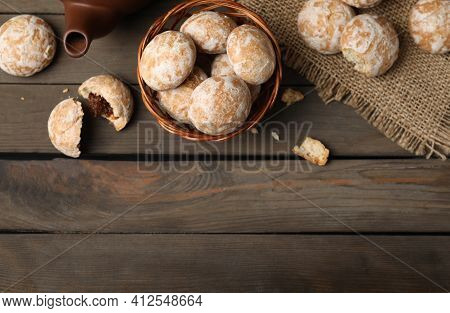 Tasty Homemade Gingerbread Cookies On Wooden Table, Flat Lay. Space For Text
