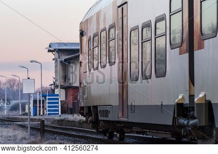 Hybrid Multiple Unit - Modern Passenger Train On A Trail On A Foggy Morning