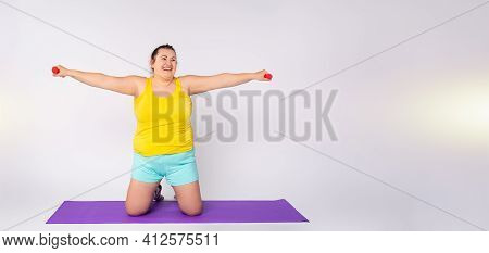 Banner, Long Format. Overweight Woman With A Smile Doing Exercises With Dumbbells For Weight Loss. B
