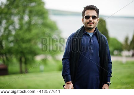 Stylish Pakistani Indian Muslim Arabic Man In Kurta Dhoti Suit And Sunglasses.