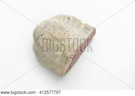 Top View Of Pork Headcheese In A Natural Casing Isolated On White Background. Homemade Brawn, Cut, W