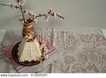 Easter Composition. Traditional Orthodox Cottage Cheese Dessert, Sprigs Of Apricot Blossoms In A Cer