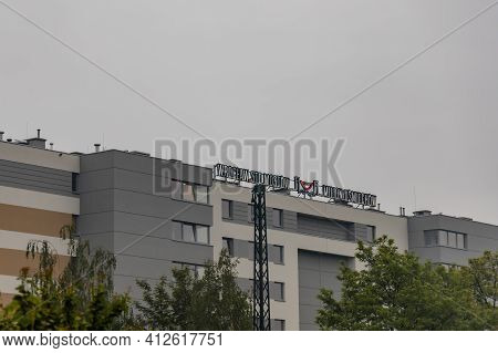 Wroclaw, Poland - May 23 2020: Colorful Sign On Top Of The Building 