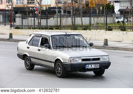 Istanbul, Turkey - February 11, 2021: Grey Car Tofas Dogan In The City Street.