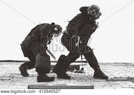 Two Commandos Train At The Base. Climbers. Swat, Police, Counterterrorism Concept. Mixed Media