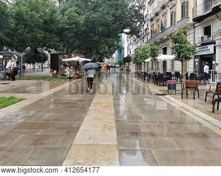Málaga, Spain - February 21, 2021: View Of Streets Of Soho Málaga In A Rainy Day