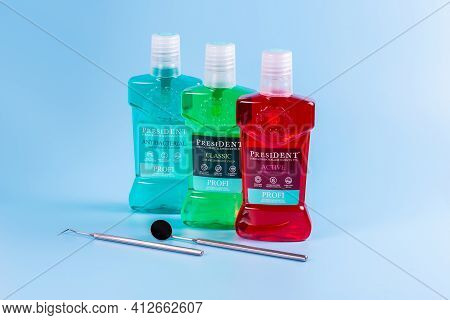 Moscow, Russia - Matra 9 2021: Mouthwash On A Blue Background.  The Concept Of Proper Oral Care Agai