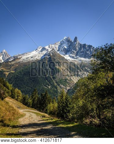 View of Aiguille du Dru (the Dru) from a hiking trail near Chamonix in French Alps