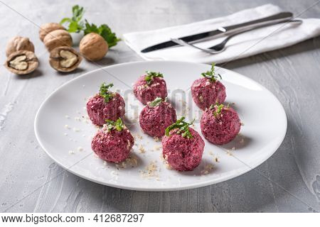 Georgian Beetroot Phali Or Pkhali With Walnuts, Garlic And On White Plate