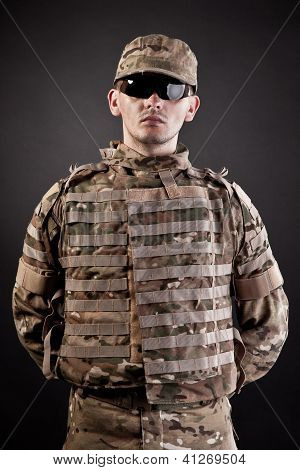 Military Man On A Black Background