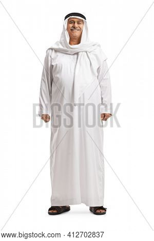 Full length portrait of a mature arab man in a traditional dishdasha isolated on white background