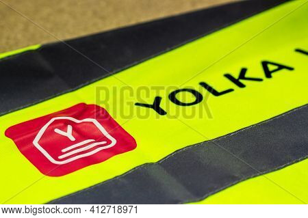 Moscow, Russia - December 16, 2020 Yolka Wms Badge On Yellow Signal Vest Close Up View. Yolka Wareho