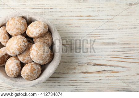 Tasty Homemade Gingerbread Cookies On White Wooden Table, Top View. Space For Text