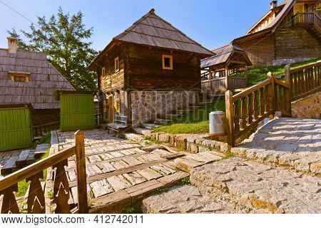 Traditional village Drvengrad Mecavnik in Serbia - architecture travel background