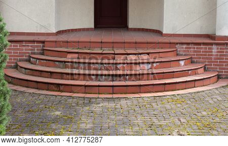 Damaged House Staircase Or Stairs With Broken Tiles Over Concrete Steps