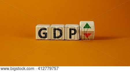 Gdp, Gross Domestic Product Symbol. Wooden Cubes With Up And Down Icon. Word 'gdp'. Beautiful Orange