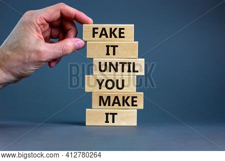 Fake It Until You Make It Symbol. Wooden Blocks With Words 'fake It Until You Make It'. Businessman 