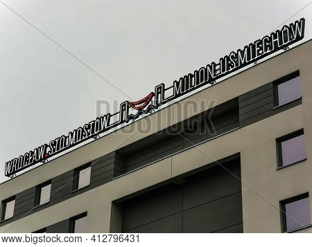 Wroclaw, Poland - May 23 2020: Colorful Sign On Top Of The Building 