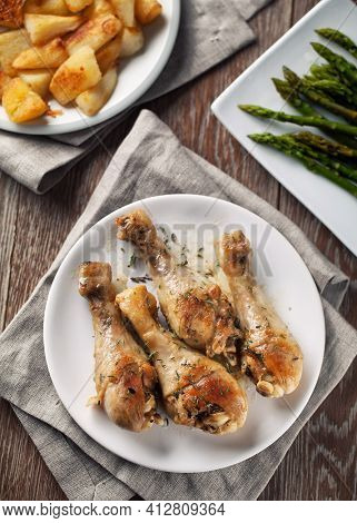 Roast Chicken On A Plate. High Quality Photo.